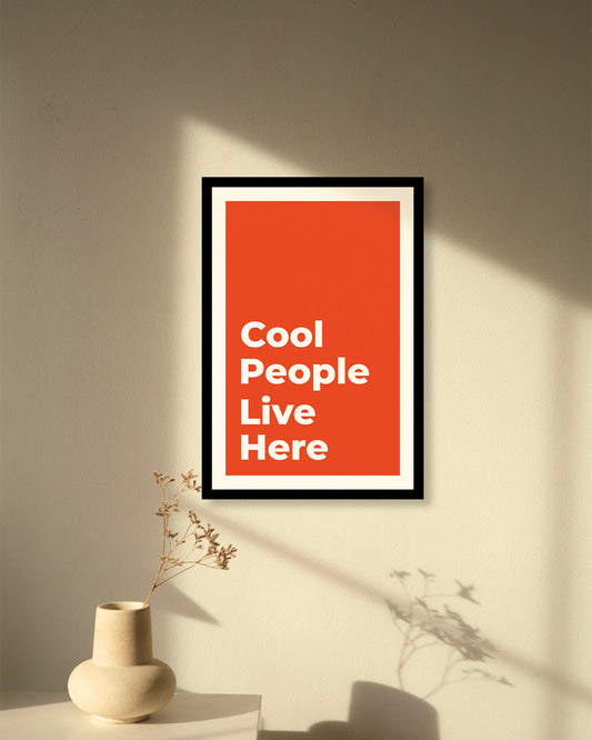 Framed poster with 'Cool People Live Here' text on a wall | Modern Typography Wall Art